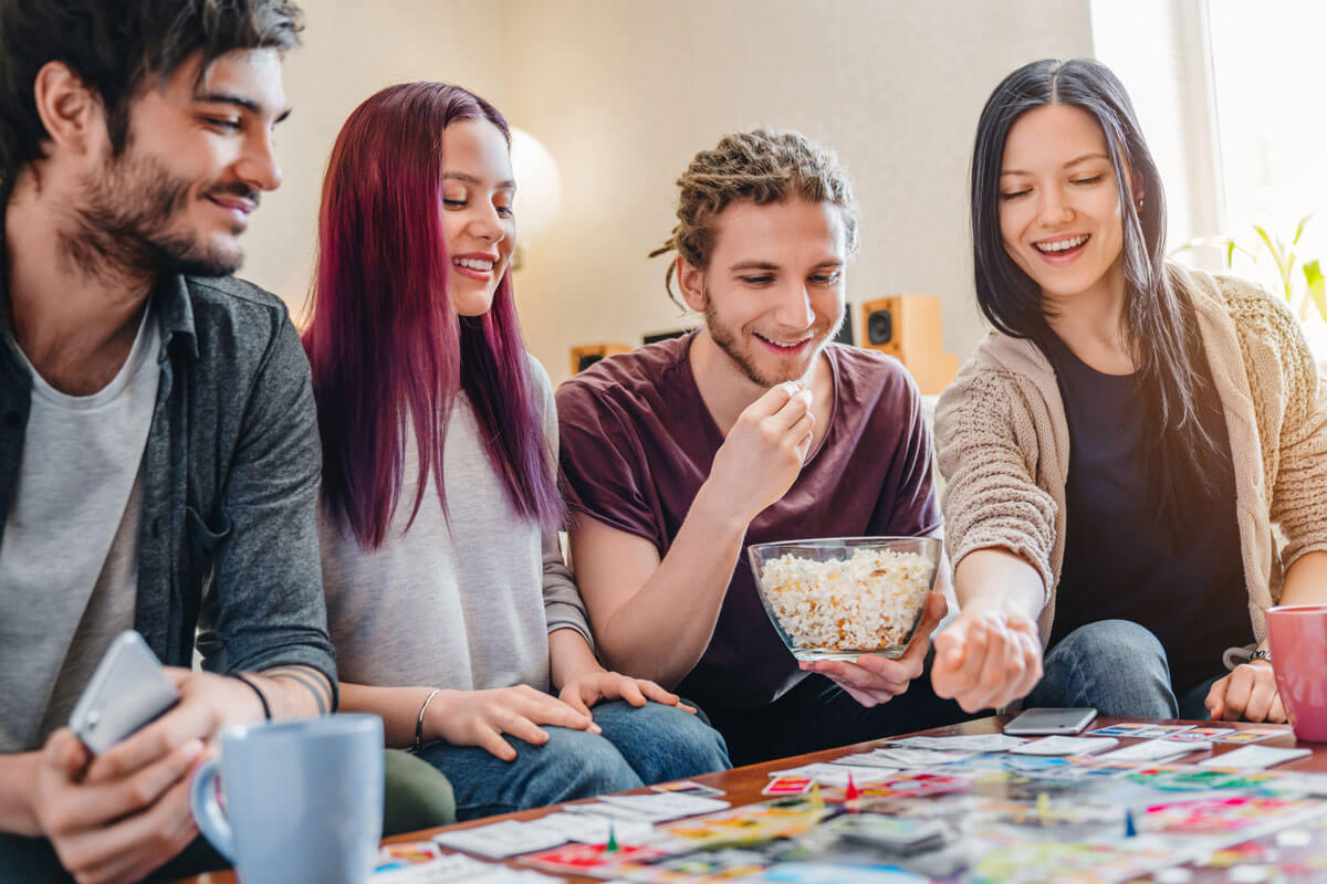 Group of happy people playing a game